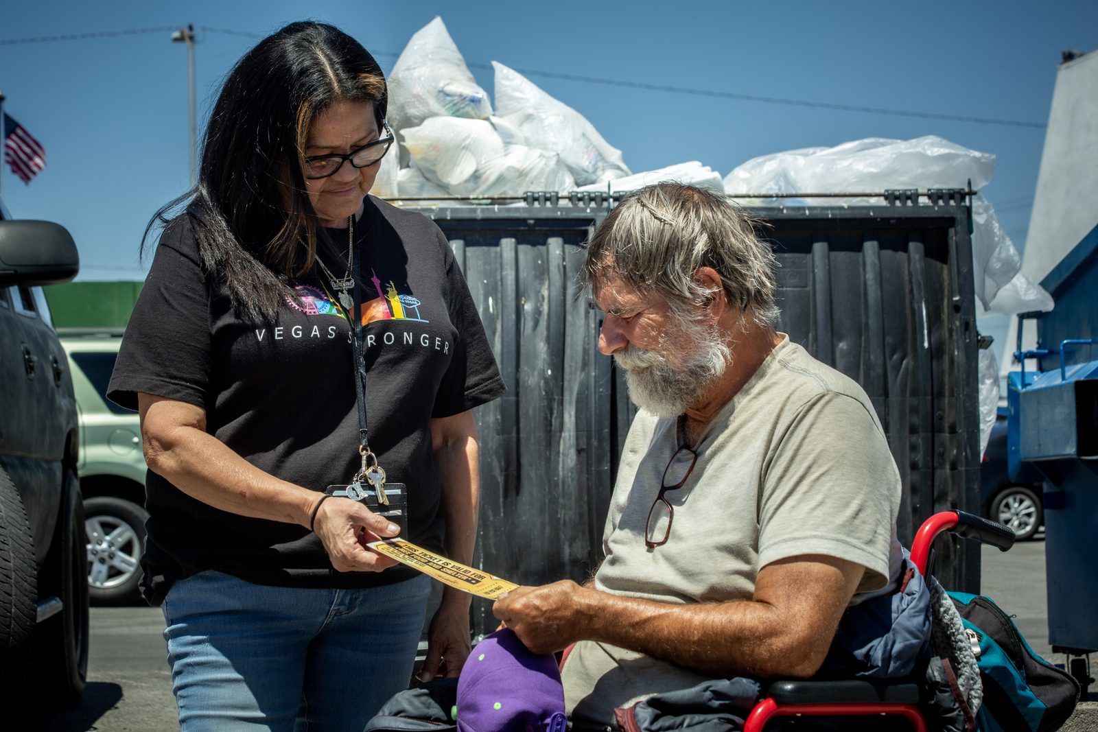 Vegas Stronger volunteer helps homeless man on street