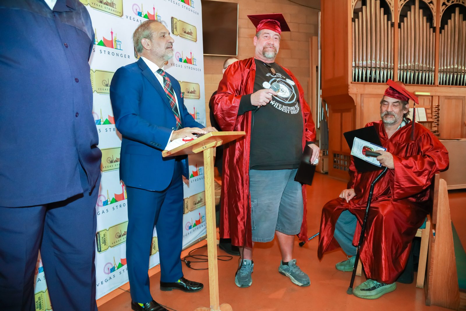 Staff members applaud at Vegas Stronger ceremony