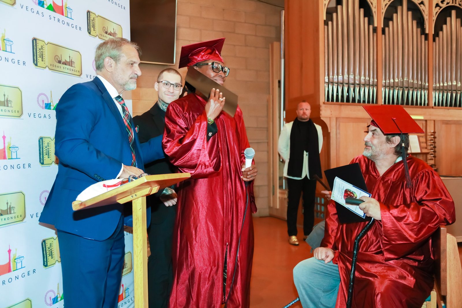 Graduate speaking at Vegas Stronger recovery graduation