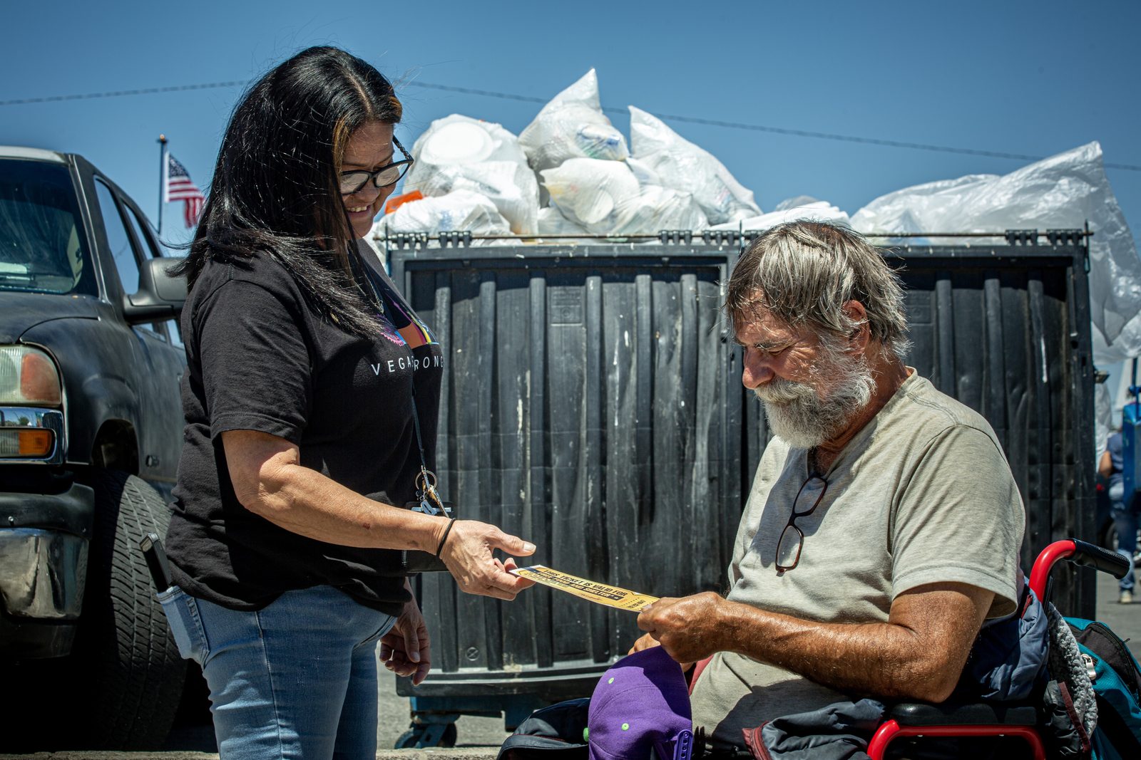 Vegas Stronger staff assists homeless man in wheelchair