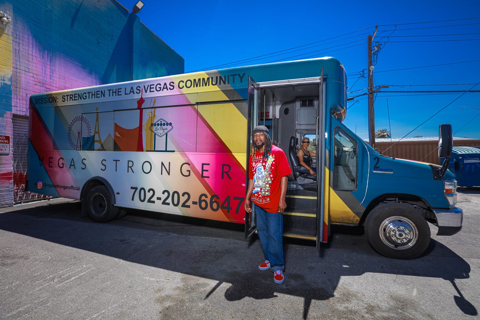Vegas Stronger volunteer helps man during street outreach
