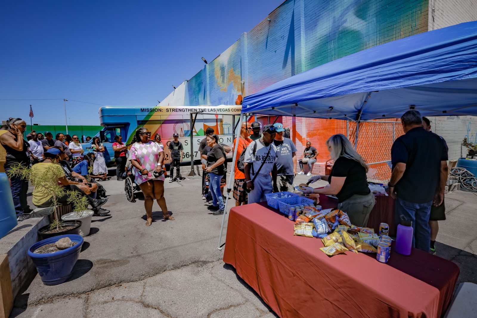 Crowd gathers at Vegas Stronger food distribution