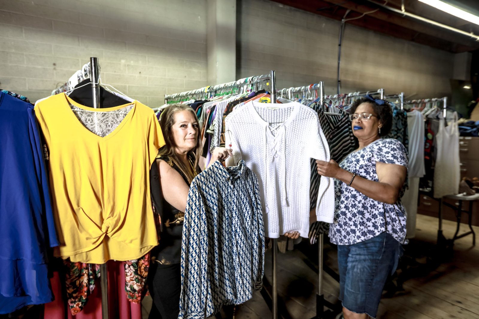 Staff reviewing donated clothes for clients in Las Vegas