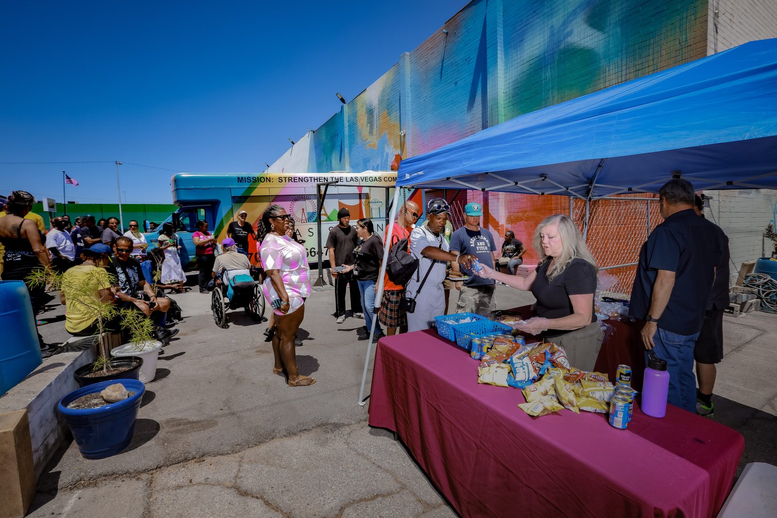 Volunteer serves food at Vegas Stronger community event